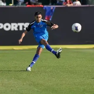 Soccer Trials at LaLiga Academy Dubai | A man in blue kicking a soccer ball