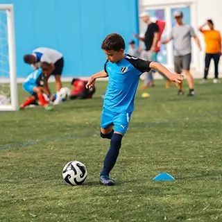 Group of Kids Playing Soccer at Football Academy