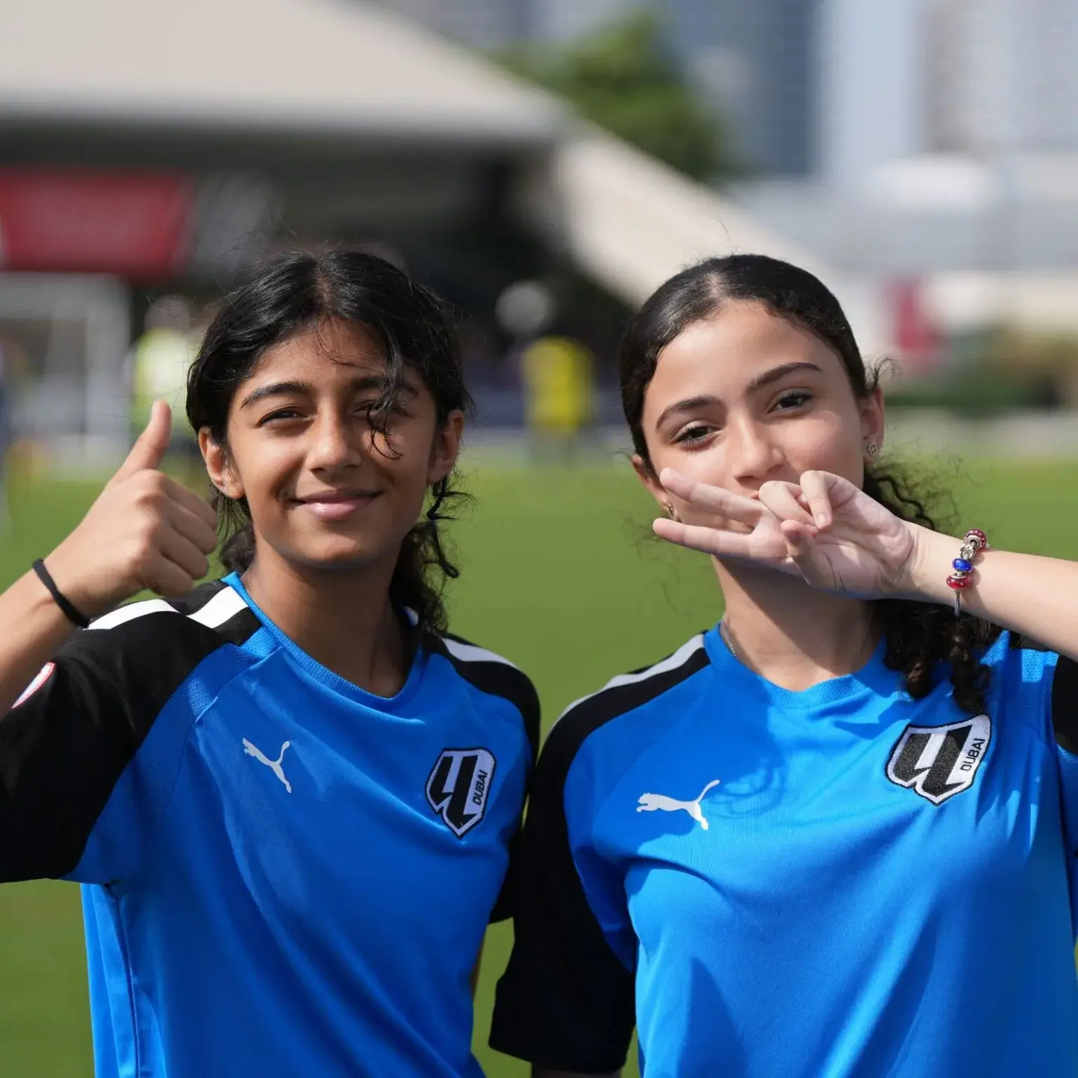 DOFA Season 2023 | Two girl player smiling and posing for a picture together .