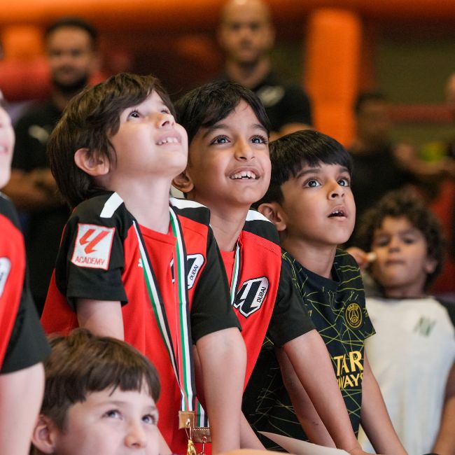 Children enrolled in LaLiga Academy attending a social event with their parents in ISD Dubai Sports City