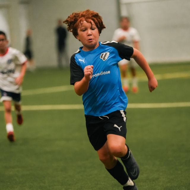 An U12 boy of LaLiga Academy Dubai's Advanced Squad during a match in DOFA league at ISD Dubai Sports City