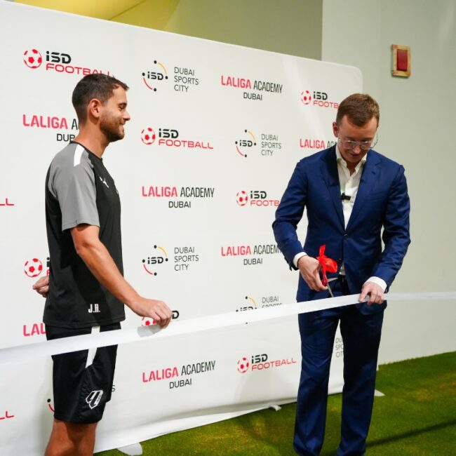 Daniels Petrovs, CEO of ISD Dubai Sports City cutting the ribbon to inaugrate ISD Dubai Sports City's full-sized indoor pitch