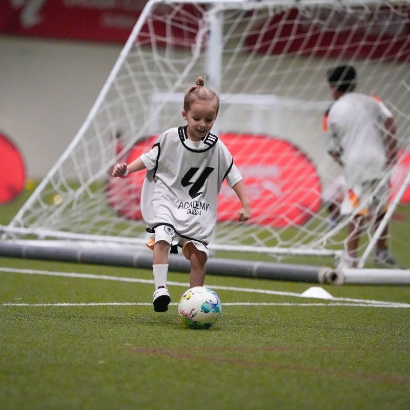 A young boy during a football camp at LaLiga Academy Dubai in Dubai Sports City