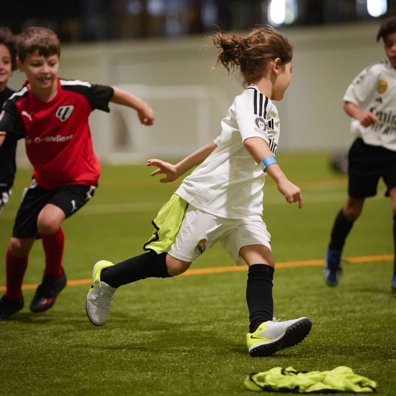 Young kids during a football drill at LaLiga Academy Dubai in Dubai Sports City