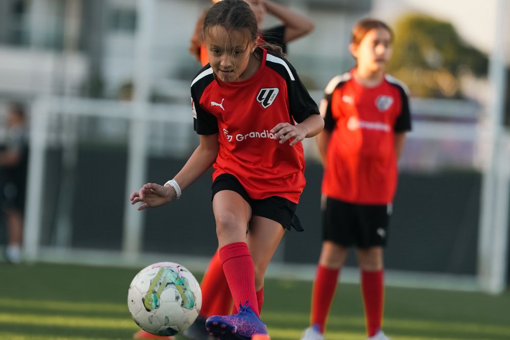 A girl at a high performance football training program near dubai sports city at laliga academy in dubai