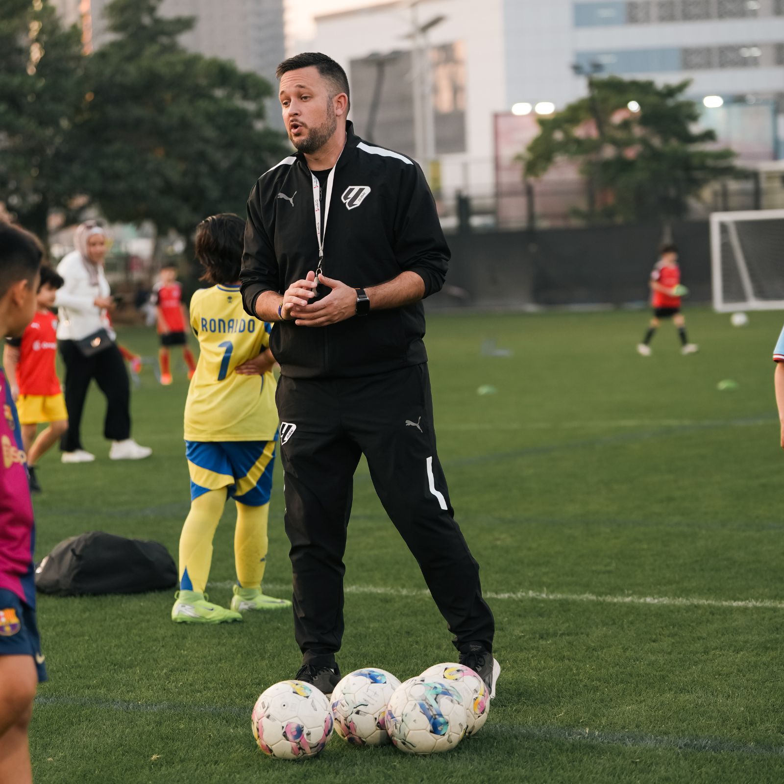 A-football-coach-during-football-classes-near you for-kids-at-laliga-academy-dubai-in-dubai-sports-city